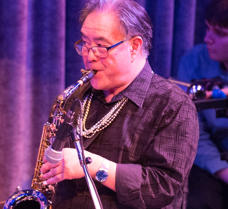 Steve Nakano (sax, flute, clarinet, congas)